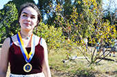 Photo: Anthropology graduate Zoe with medal