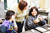Photo: Anthropology professor with students and ceramics study