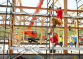 Constructions workers at barn raising