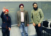 From left to right: Hoodini, Professor Nirvikar Singh and Baagi. 