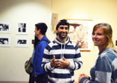 Faculty, staff, students, community members, and friends all gather to view student produced media about low wage worker conditions in Santa Cruz county. Sociology student Edward Ramirez took many of the photos on display. 