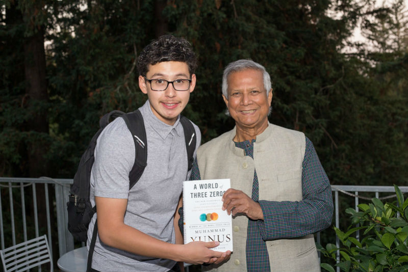 Yunus with a student