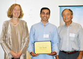 Edris Sherdil receiving the 2019 Keeley Award from Dean Katharyne Mitchell and Mark Carr