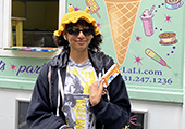 student with ice cream and slug hat